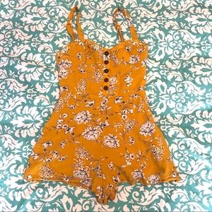 Valija Mustard Floral Romper